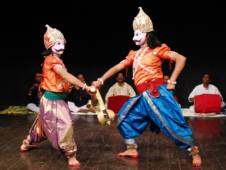 Two dance performers at a Diwali festival.