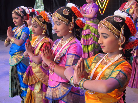 Girls dressed in traditional clothing to celebrate at a Diwali festival.