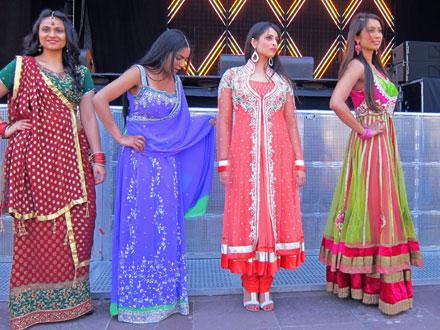 Diwali fashion show participants in traditional clothing.